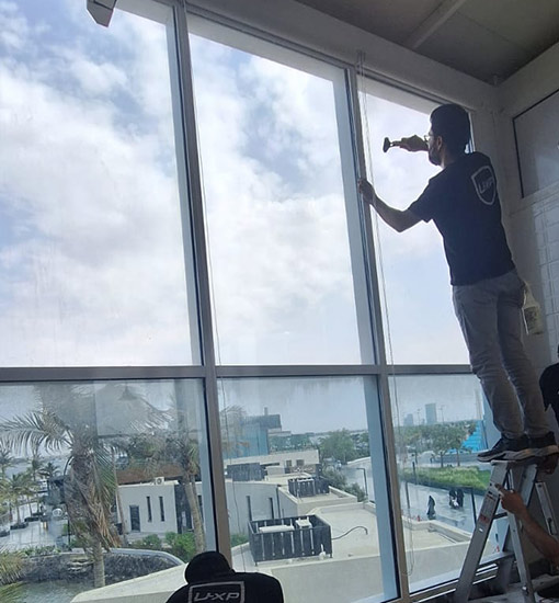 عزل حراري للزجاج ونوافذ المباني